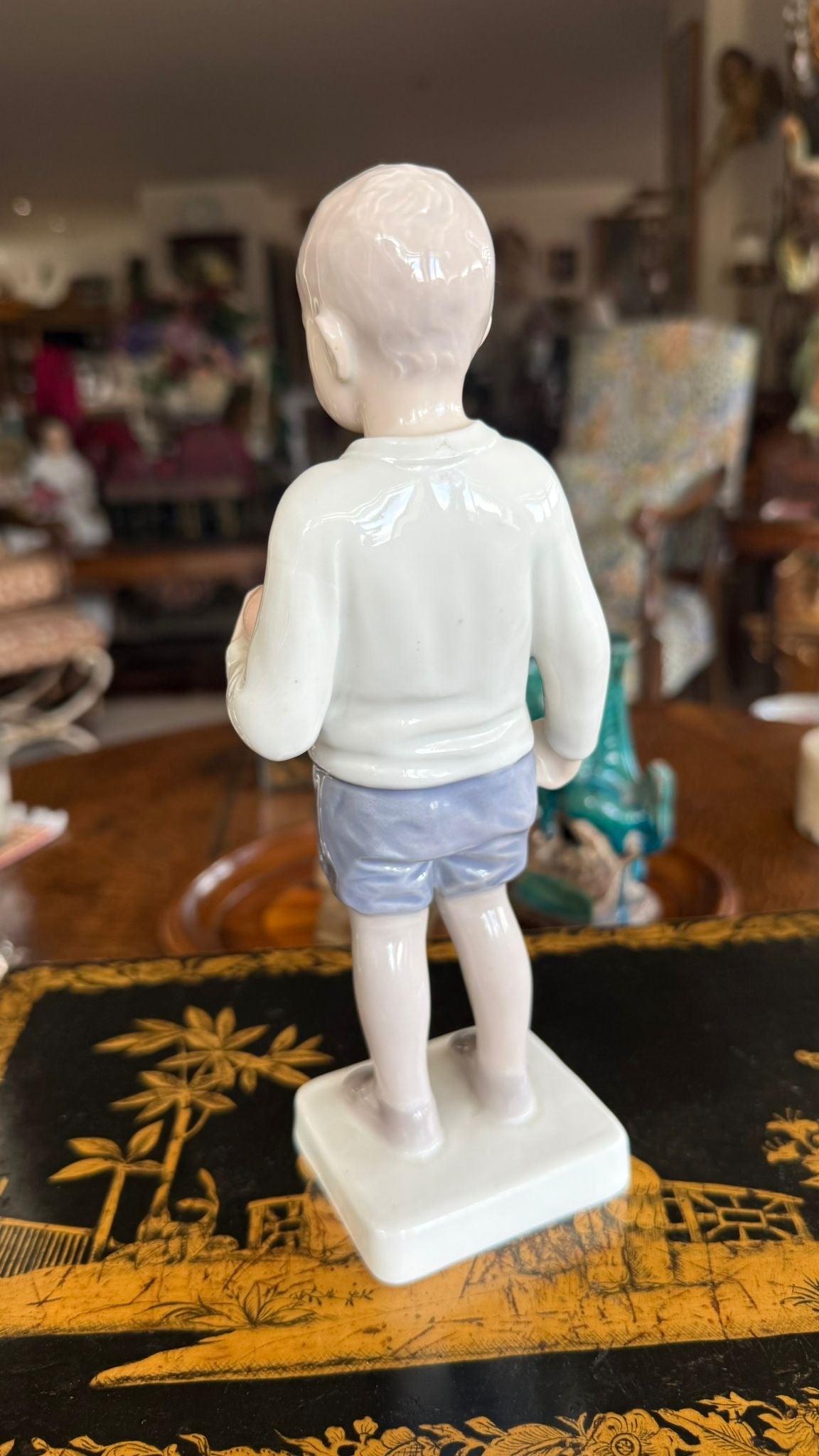 Porcelain figure of a little boy with his ball B&G factory Copenhagen 1945