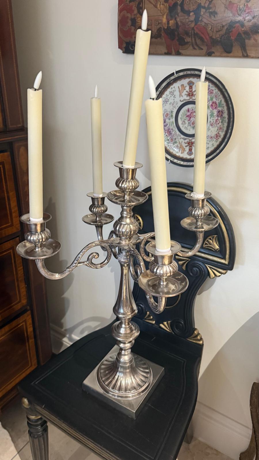 Pair of large silver plated candelabras