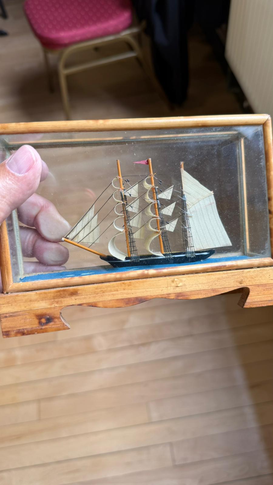 Pair of miniature wooden ships in case