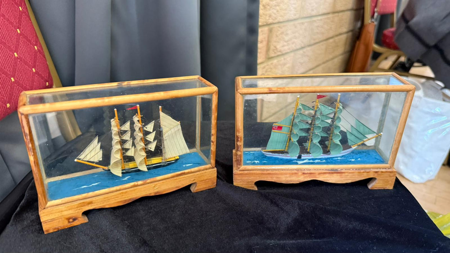 Pair of miniature wooden ships in case