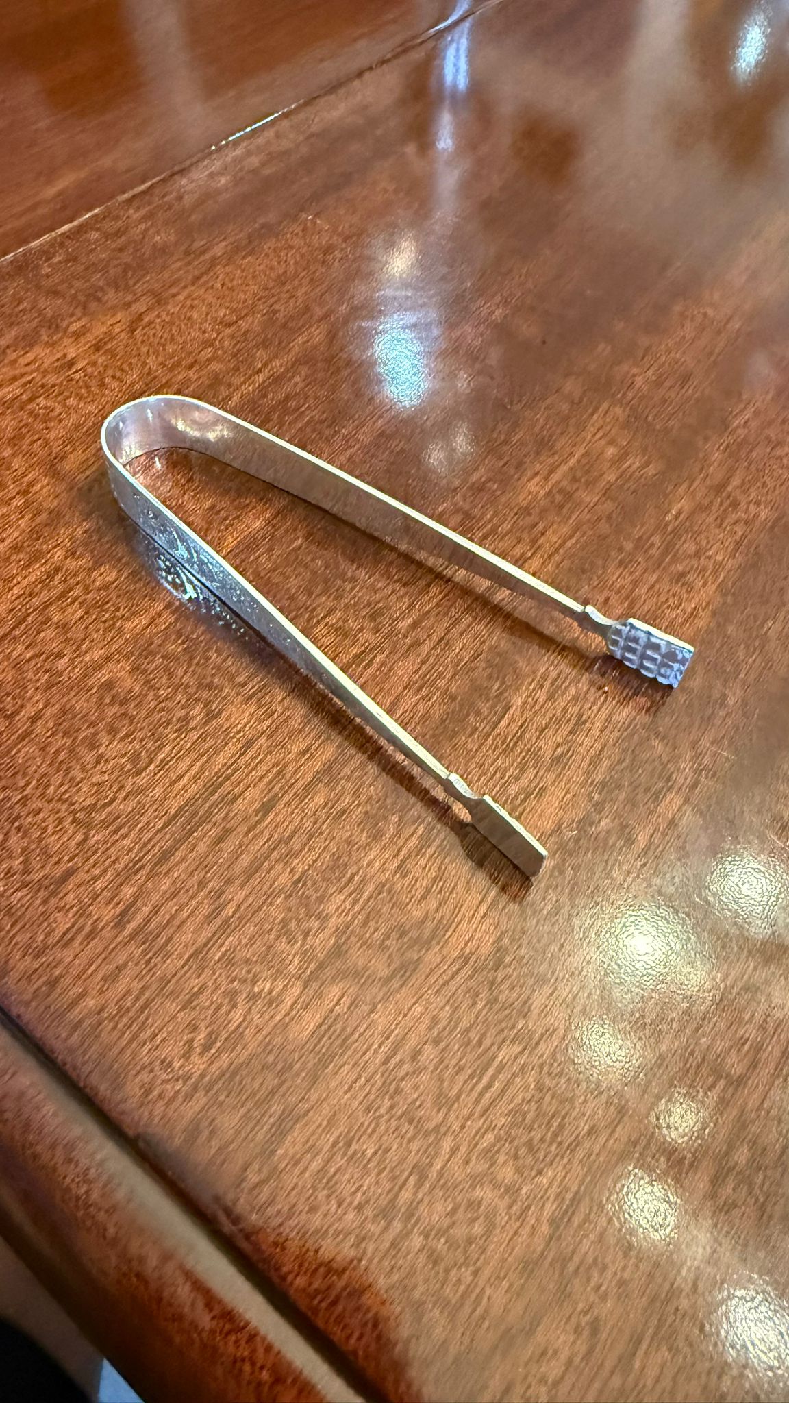 Silver plated sugar tongs