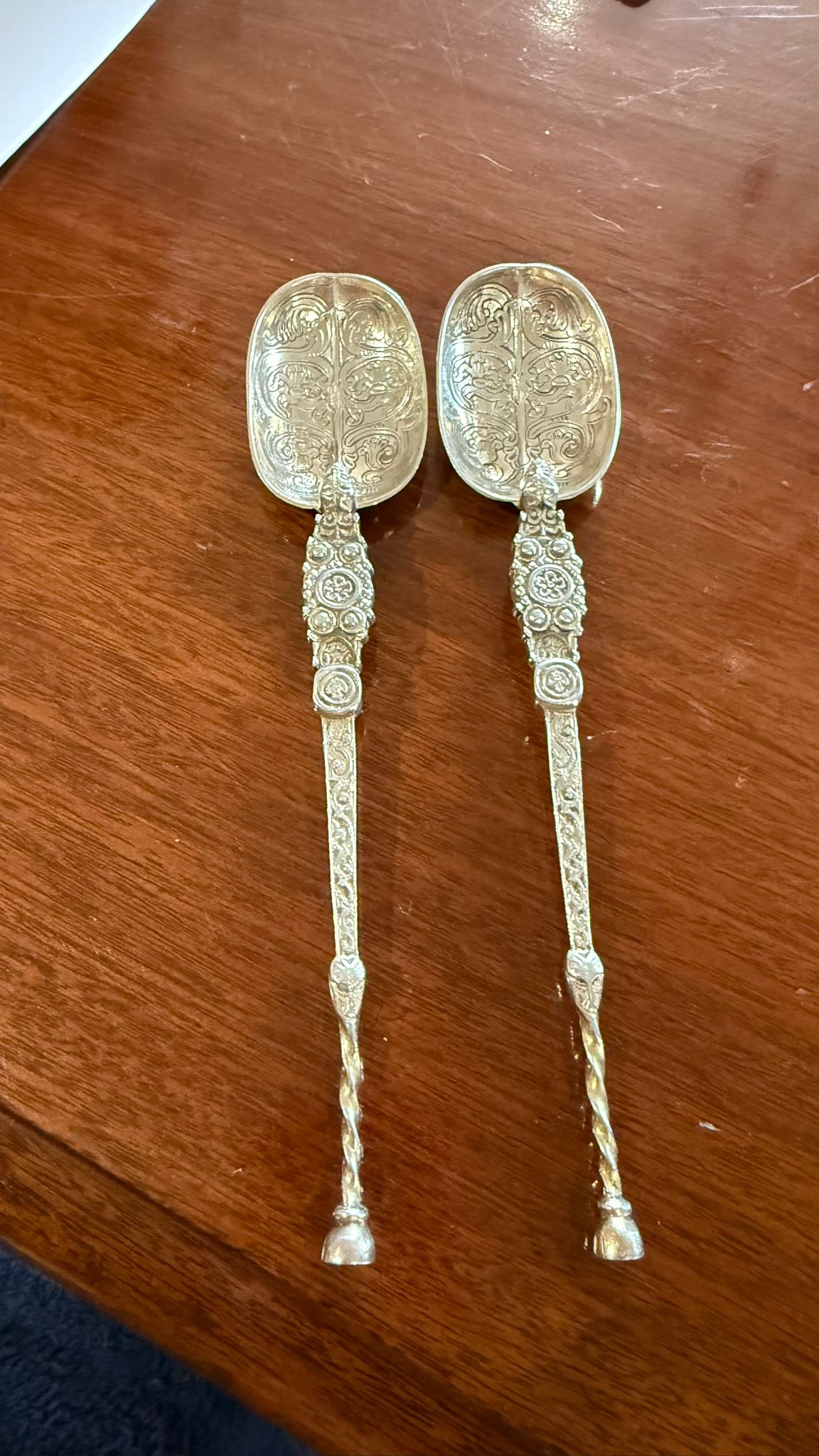 Pair of very ornate silver plated spoons