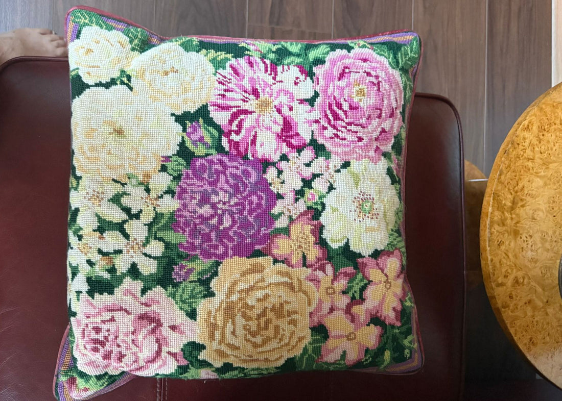 Tapestry cushion with classical design inspired by historic interiors