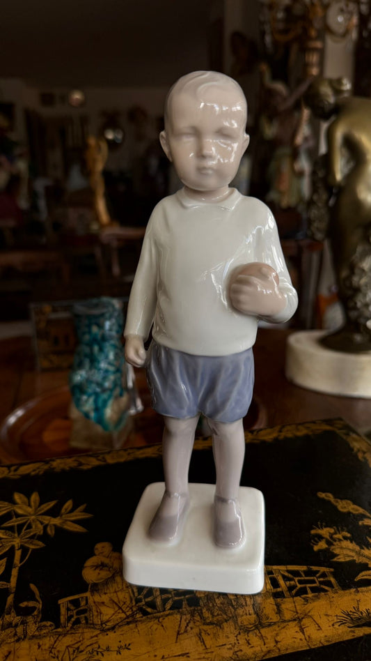 Porcelain figure of a little boy with his ball B&G factory Copenhagen 1945