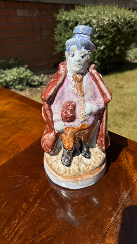 Glazed Terracotta Flask of a Woman