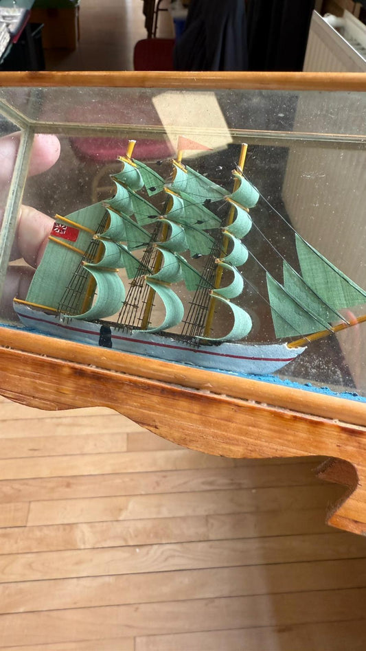 Pair of miniature wooden ships in case
