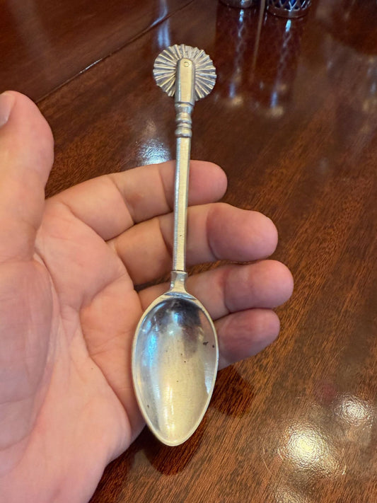 Silver plated spoon with cutter