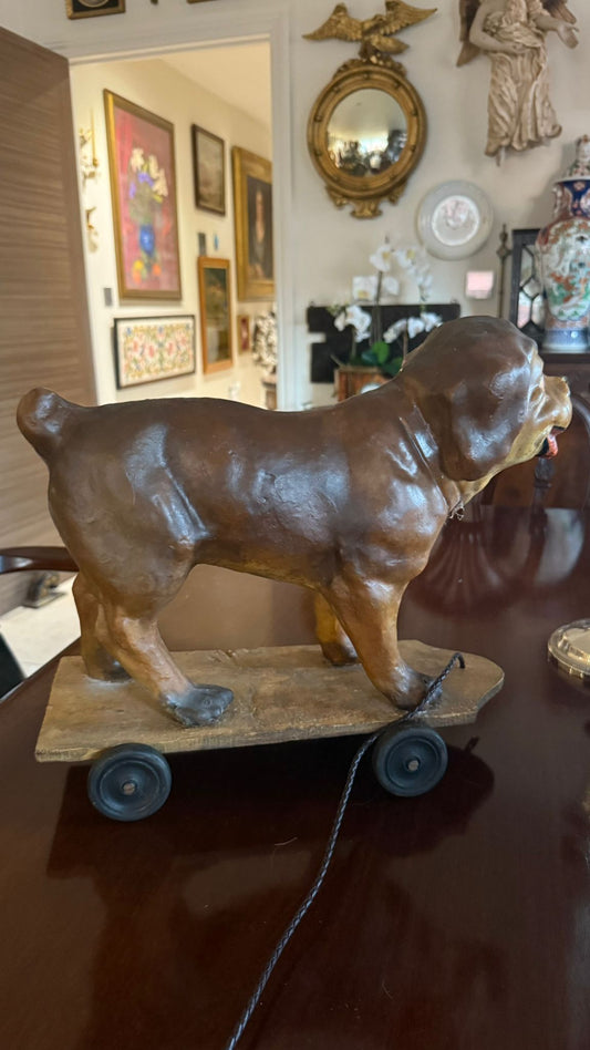 Pull along toy of a pug