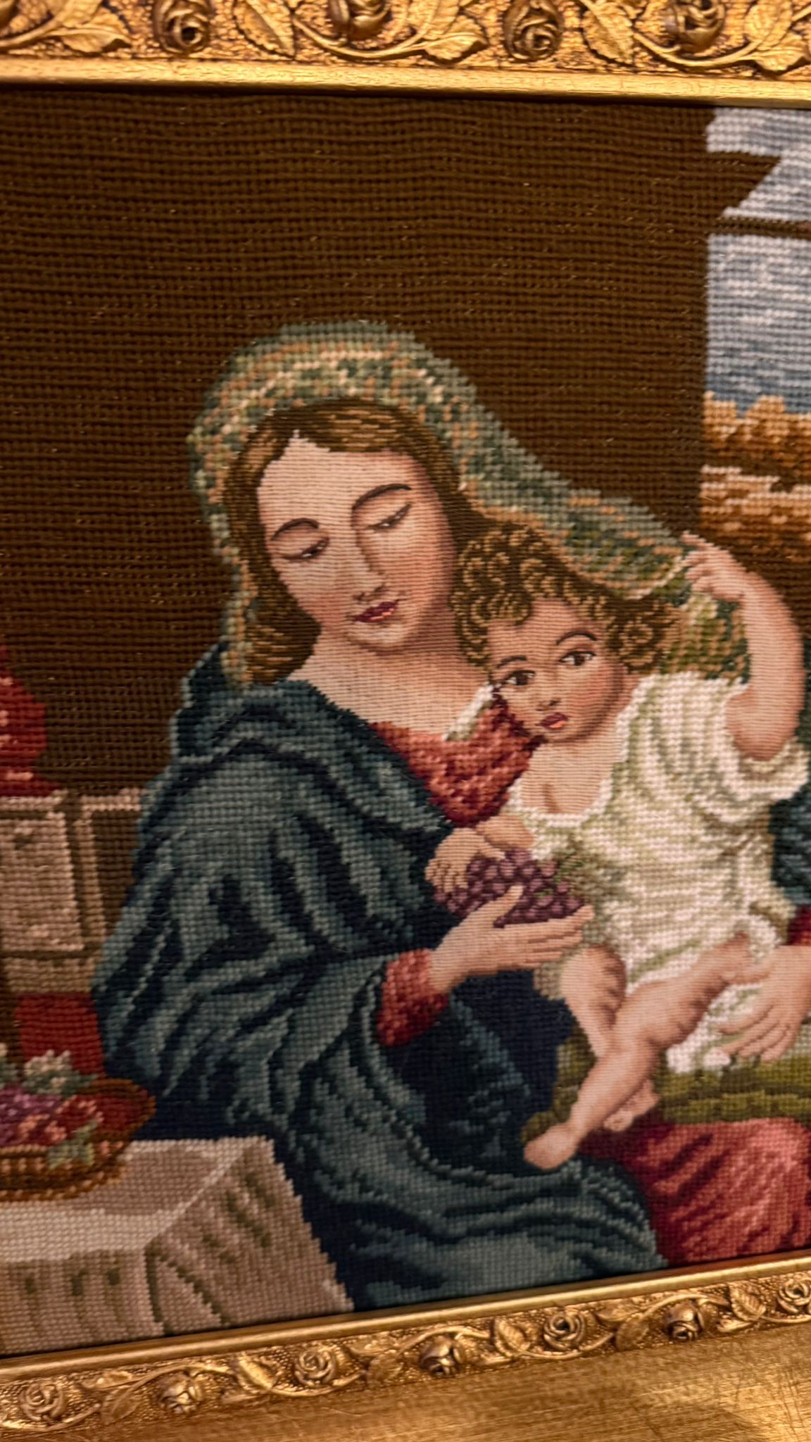 Hand sewn tapestry in frame