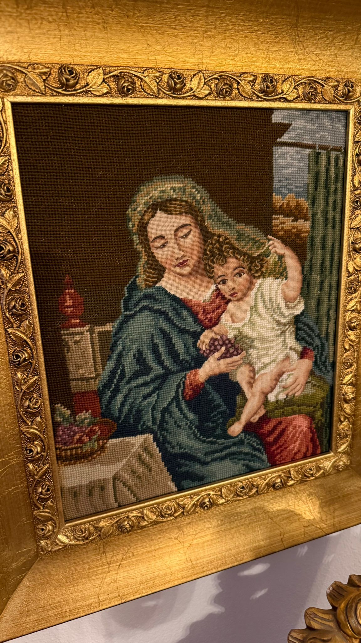 Hand sewn tapestry in frame